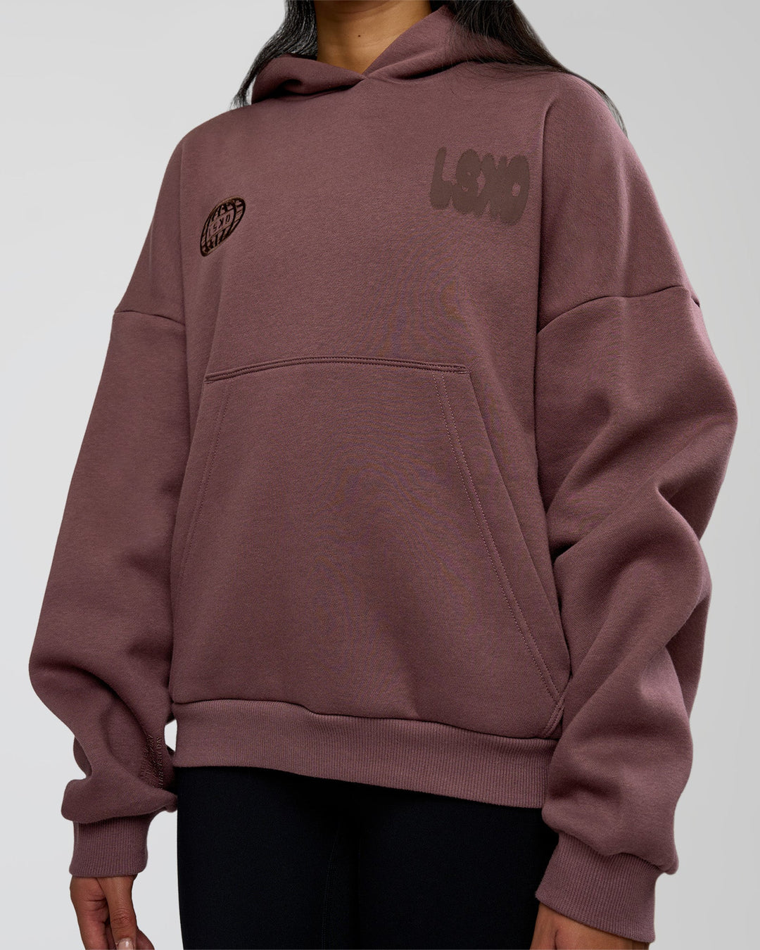 Woman wearing Static Grit Unisex Boxy Hoodie - Cocoa Powder-Hot Chocolate | Model:Loren | Size:XS