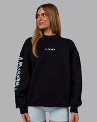 Woman wearing Static Oversized Sweater - Black-Skyride | Model:Emilie | Size:XS