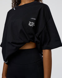 Woman wearing Sticker Heavyweight Oversized Tee - Black-White | Model:Jordan | Size:XS