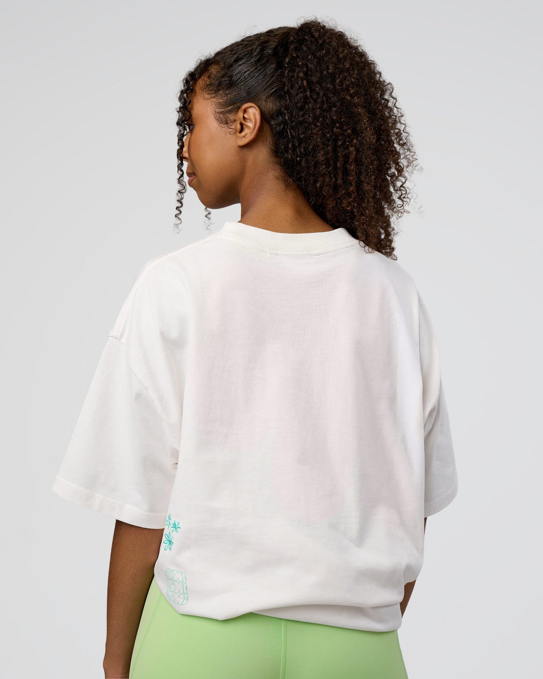 Woman wearing Sticker Heavyweight Oversized Tee - Off White-Jelly Mint | Model:Jordan | Size:XS