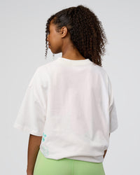 Woman wearing Sticker Heavyweight Oversized Tee - Off White-Jelly Mint | Model:Jordan | Size:XS