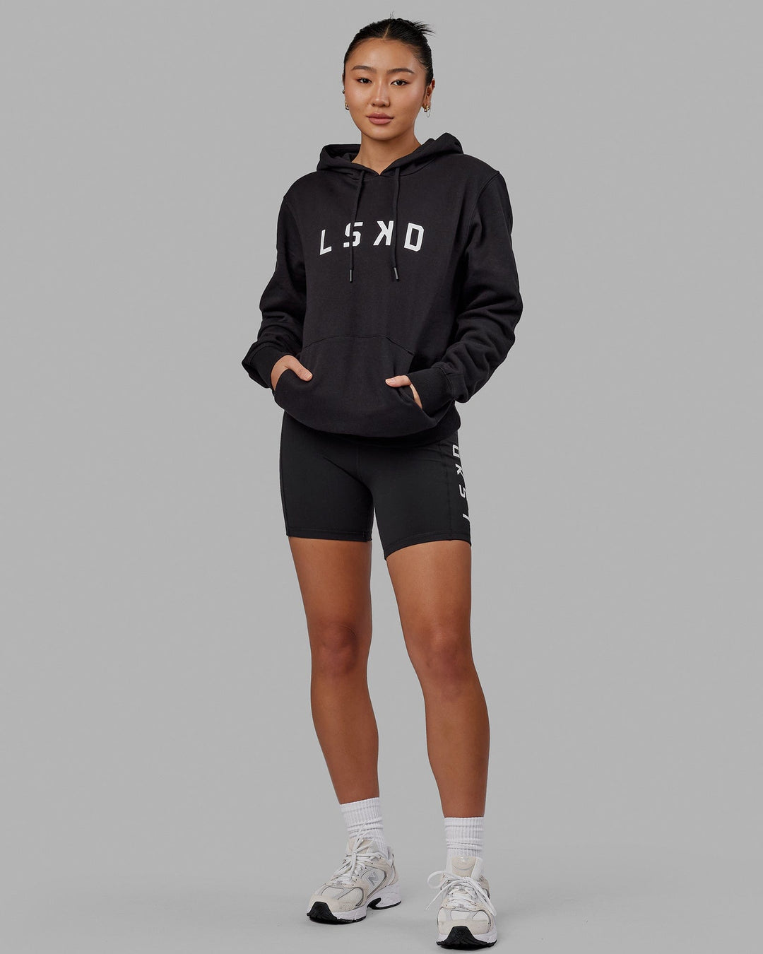 Woman wearing Unisex Structure Hoodie - Black-White