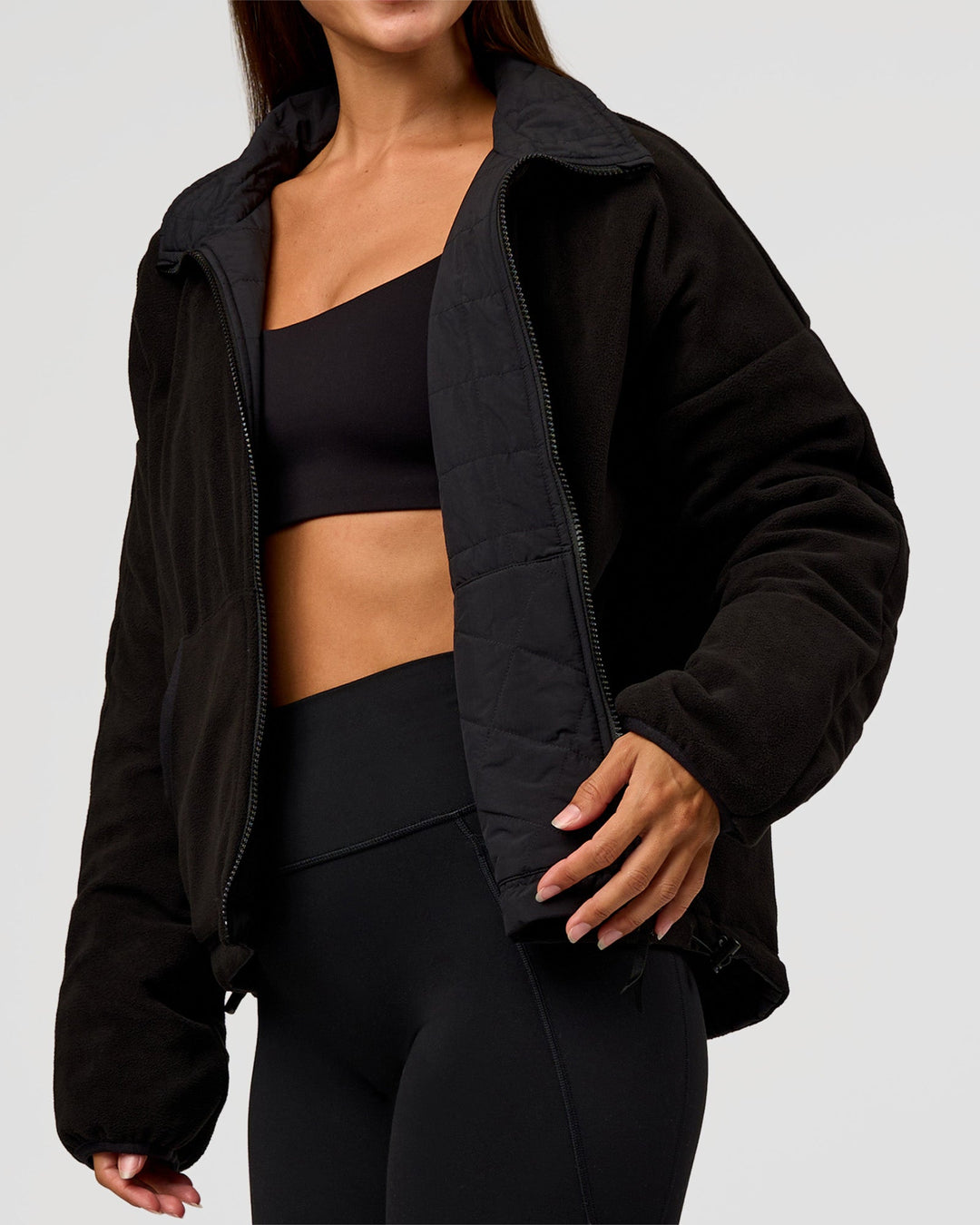 Woman wearing Thrive Reversible Jacket - Black | Model:Brylee | Size:XS