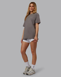 Woman wearing Trust The Process 2.0 FLXCotton Tee Oversize - Storm Front-Shale Beige | Model:Emilie | Size:XS