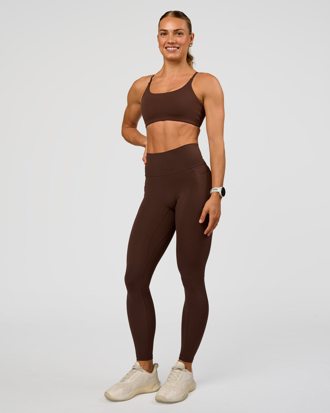 Woman wearing Twist Sports Bra - Hot Chocolate | Model:Maja | Size:XS - view 7