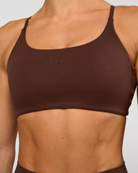Woman wearing Twist Sports Bra - Hot Chocolate | Model:Maja | Size:XS | Thumbnail Index: 2