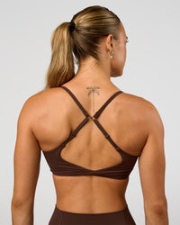 Woman wearing Twist Sports Bra - Hot Chocolate | Model:Maja | Size:XS | Thumbnail Index: 4