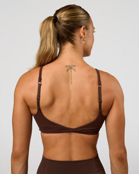 Woman wearing Twist Sports Bra - Hot Chocolate | Model:Maja | Size:XS | Thumbnail Index: 3