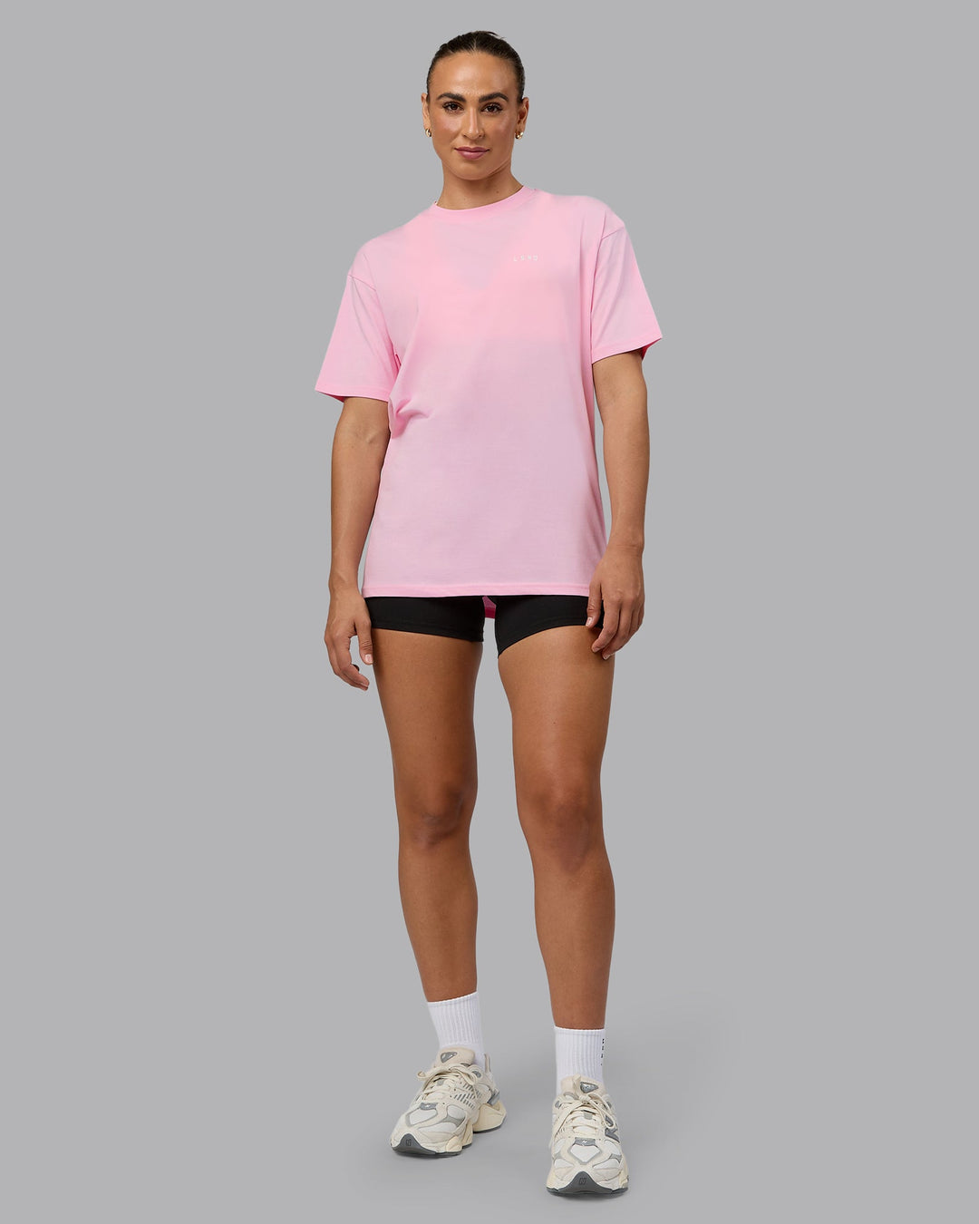 Woman wearing Unisex 1% Better Value Series FLXCotton Tee Oversize - Pale Pink-White