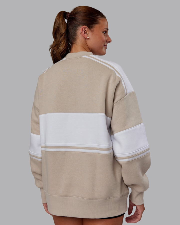 Woman wearing A-Team Sweater Oversize - Shale Beige-White | Model:Phoebe | Size:XS
