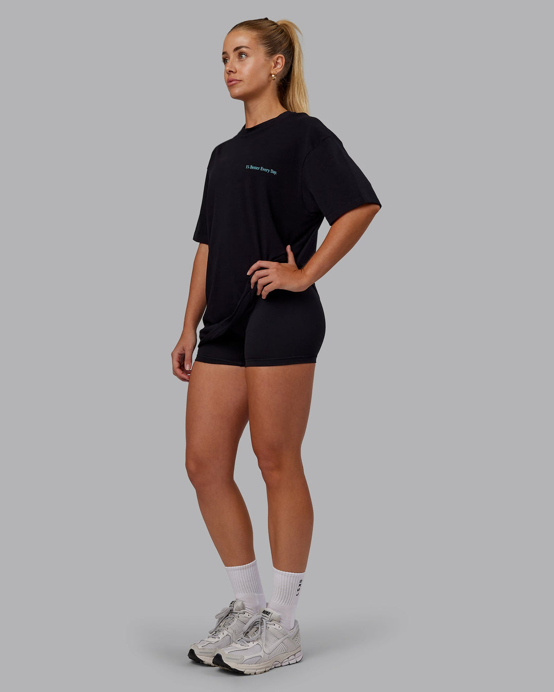 Woman wearing Better Every Day FLXCotton Tee Oversize in Black-Blue Atoll | Size:XS | Model:Hannah