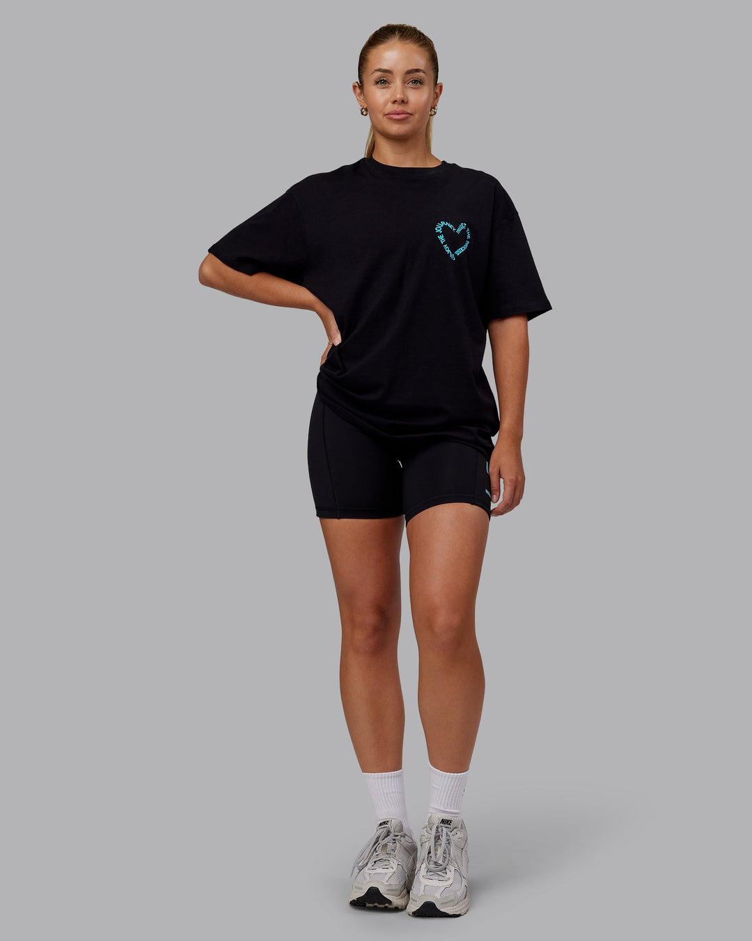 Woman wearing Love The Process FLXCotton Oversize Tee - Black-Blue Atoll | Model:Hannah | Size:XS