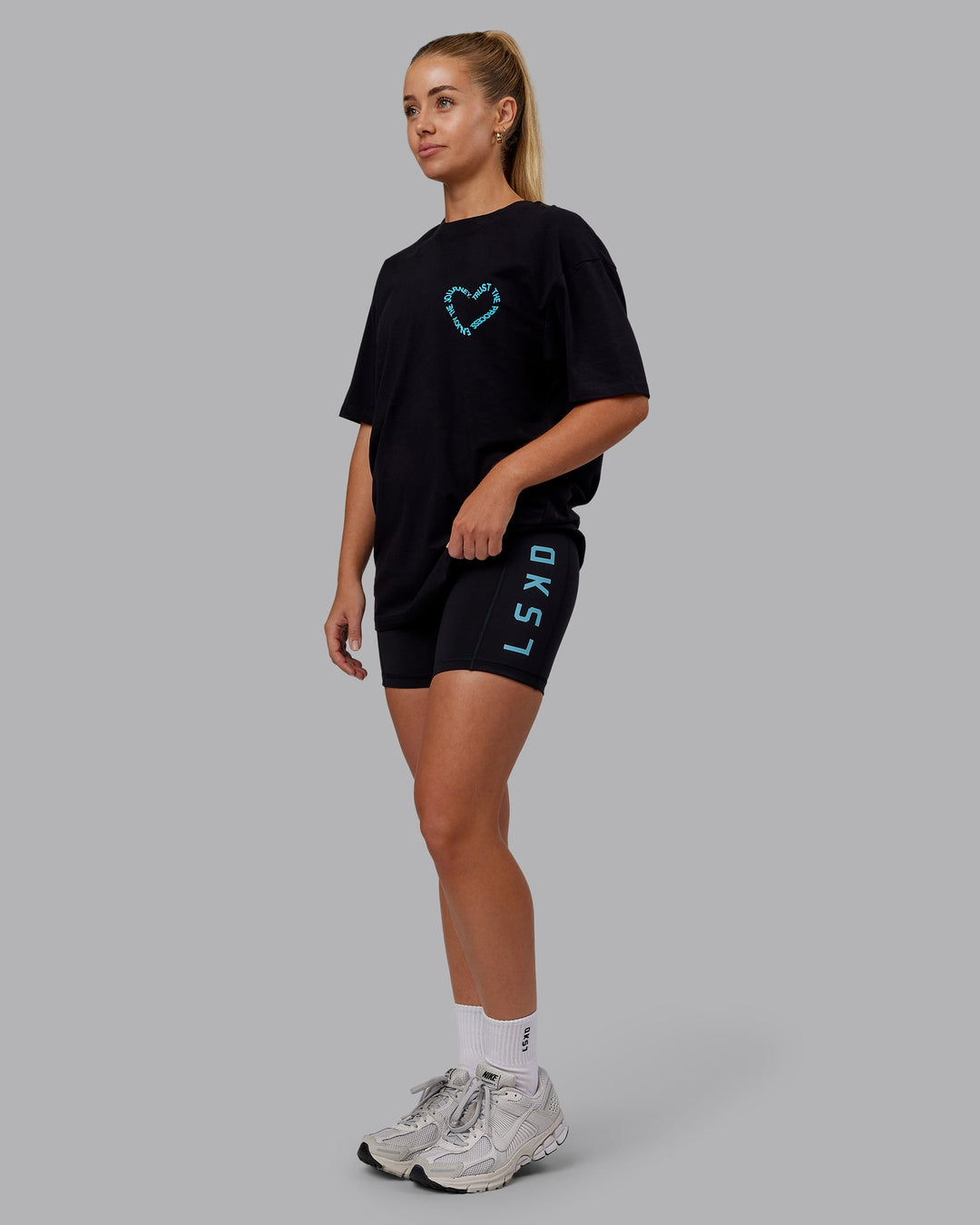 Woman wearing Love The Process FLXCotton Oversize Tee - Black-Blue Atoll | Model:Hannah | Size:XS