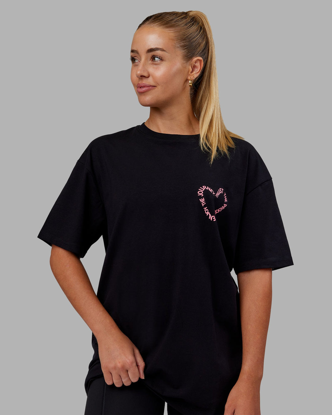 Woman wearing Love The Process FLXCotton Oversize Tee - Black-Pink Lemonade | Model:Hannah | Size:XS