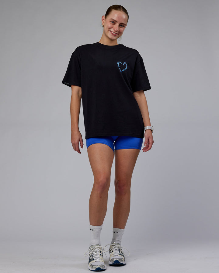 Woman wearing Unisex Love The Process FLXCotton Oversize Tee - Black-Power Cobalt
