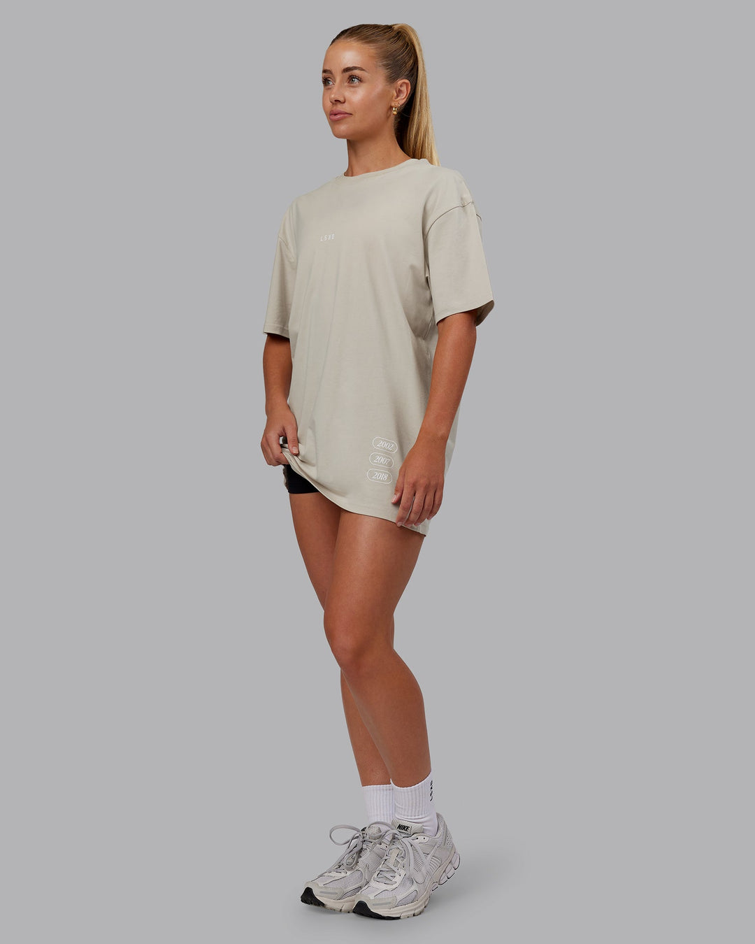 Woman wearing Timeline FLXCotton Oversized Tee - Shale Beige-White | Model:Hannah | Size:XS