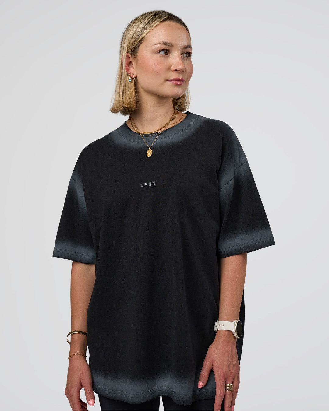 Woman wearing Urban Blur Heavyweight Unisex Oversized Tee - Black-Dark Storm | Model:Halle | Size:XS