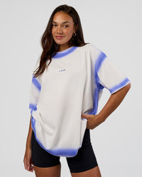 Woman wearing Urban Blur Heavyweight Unisex Oversized Tee - Off White-Power Cobalt | Model:Kirstyn | Size:XS
