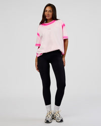 Woman wearing Urban Blur Heavyweight Unisex Oversized Tee - Off White-Ultra Pink | Model:Kirstyn | Size:XS