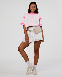 Woman wearing Urban Blur Heavyweight Unisex Oversized Tee - Off White-Ultra Pink | Model:Kirstyn | Size:XS