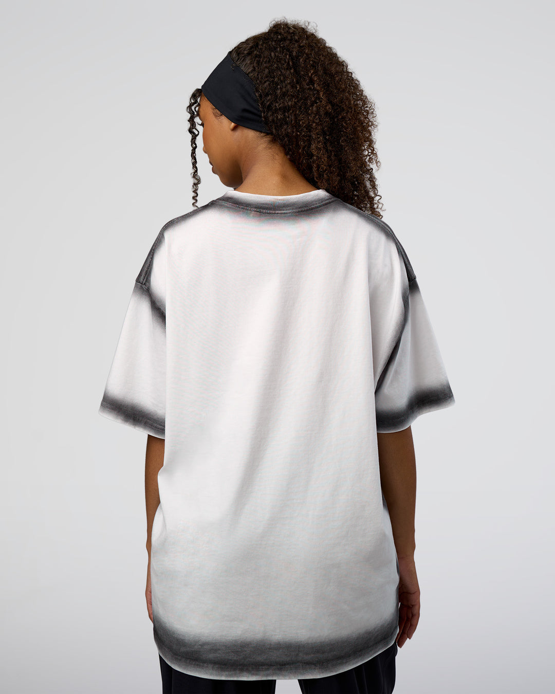 Woman wearing Urban Blur Heavyweight Unisex Oversized Tee - White-Black | Model:Jordan | Size:S