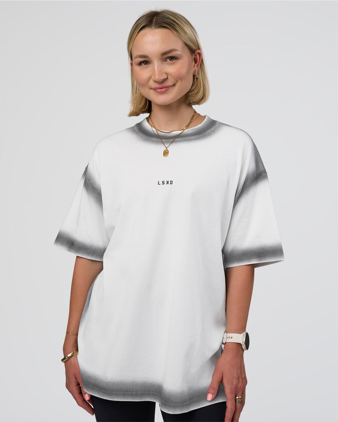 Woman wearing Urban Blur Heavyweight Unisex Oversized Tee - White-Black | Model:Halle | Size:XS