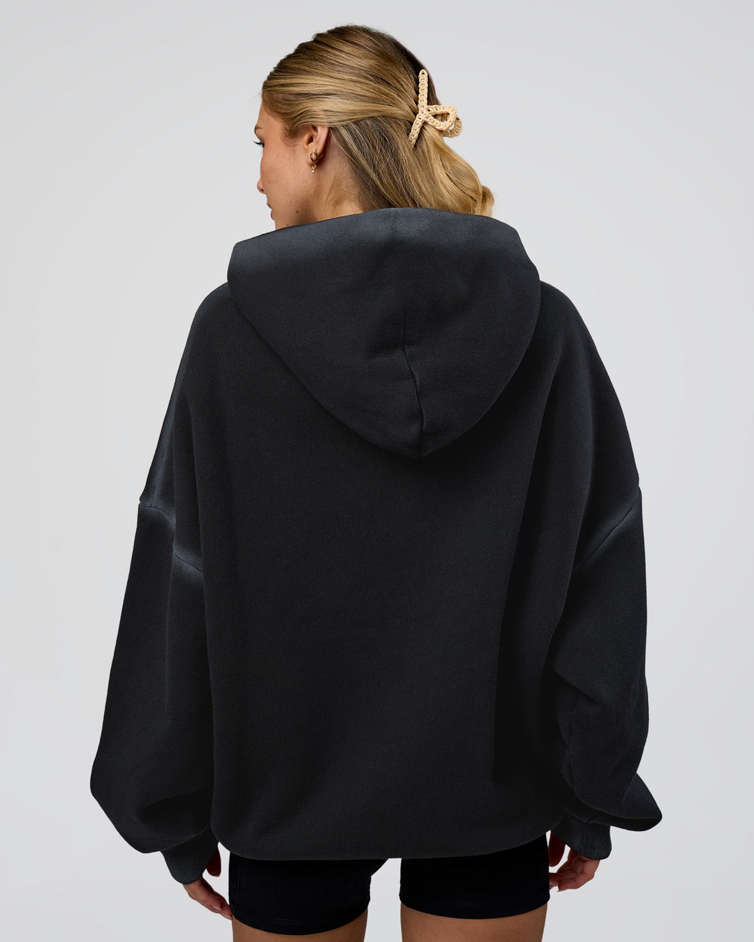 Woman wearing Urban Blur Unisex Oversized Hoodie - Black-Dark Storm | Model:Leilani | Size:XS