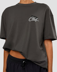 Woman wearing Values Run Club FLXCotton Tee - Dark Storm-Alloy | Model:Georgia | Size:XS