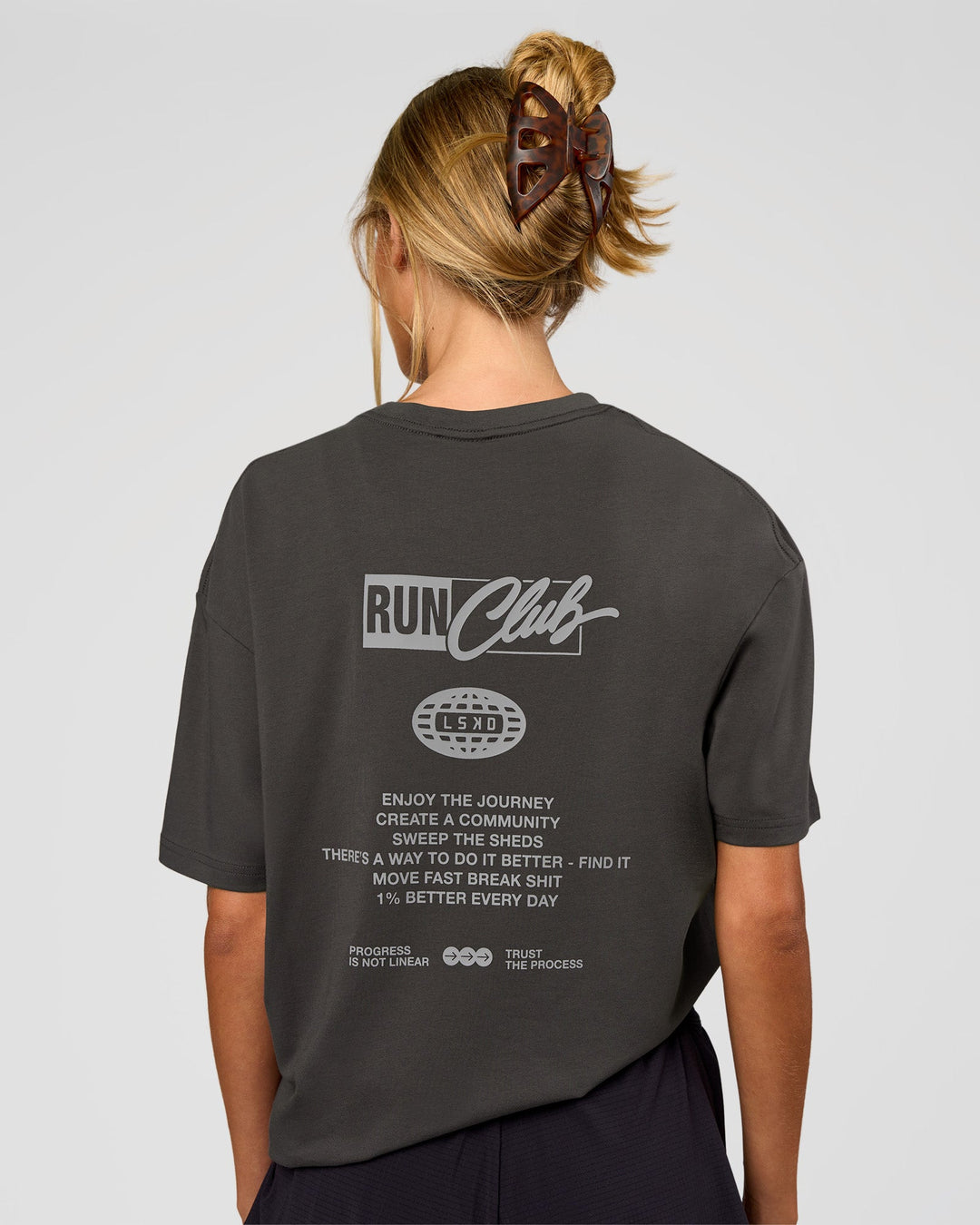 Woman wearing Values Run Club FLXCotton Tee - Dark Storm-Alloy | Model:Georgia | Size:XS