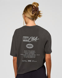 Woman wearing Values Run Club FLXCotton Tee - Dark Storm-Alloy | Model:Georgia | Size:XS