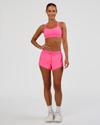 Woman wearing Velocity Sports Bra - Sugar Plum | Model:Brylee | Size:XS