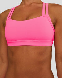 Woman wearing Velocity Sports Bra - Sugar Plum | Model:Brylee | Size:XS