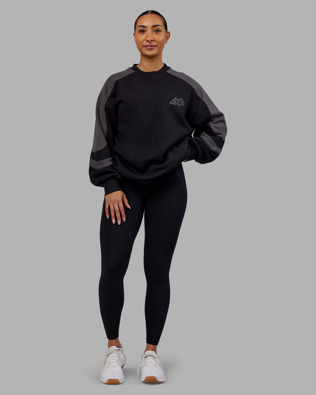 Woman wearing Vibe Oversized Unisex Sweater - Black-Dark Storm | Model:Ayla  Size:XS