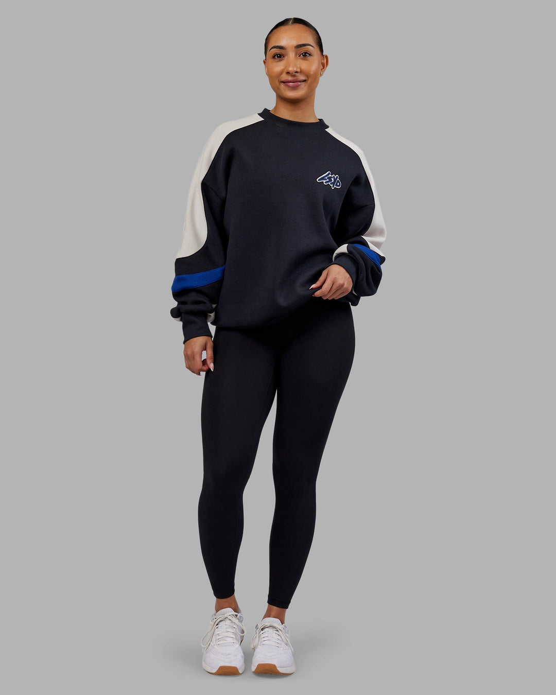 Woman wearing Vibe Oversized Unisex Sweater - Caviar-Midnight Blue | Model:Ayla | Size:XS