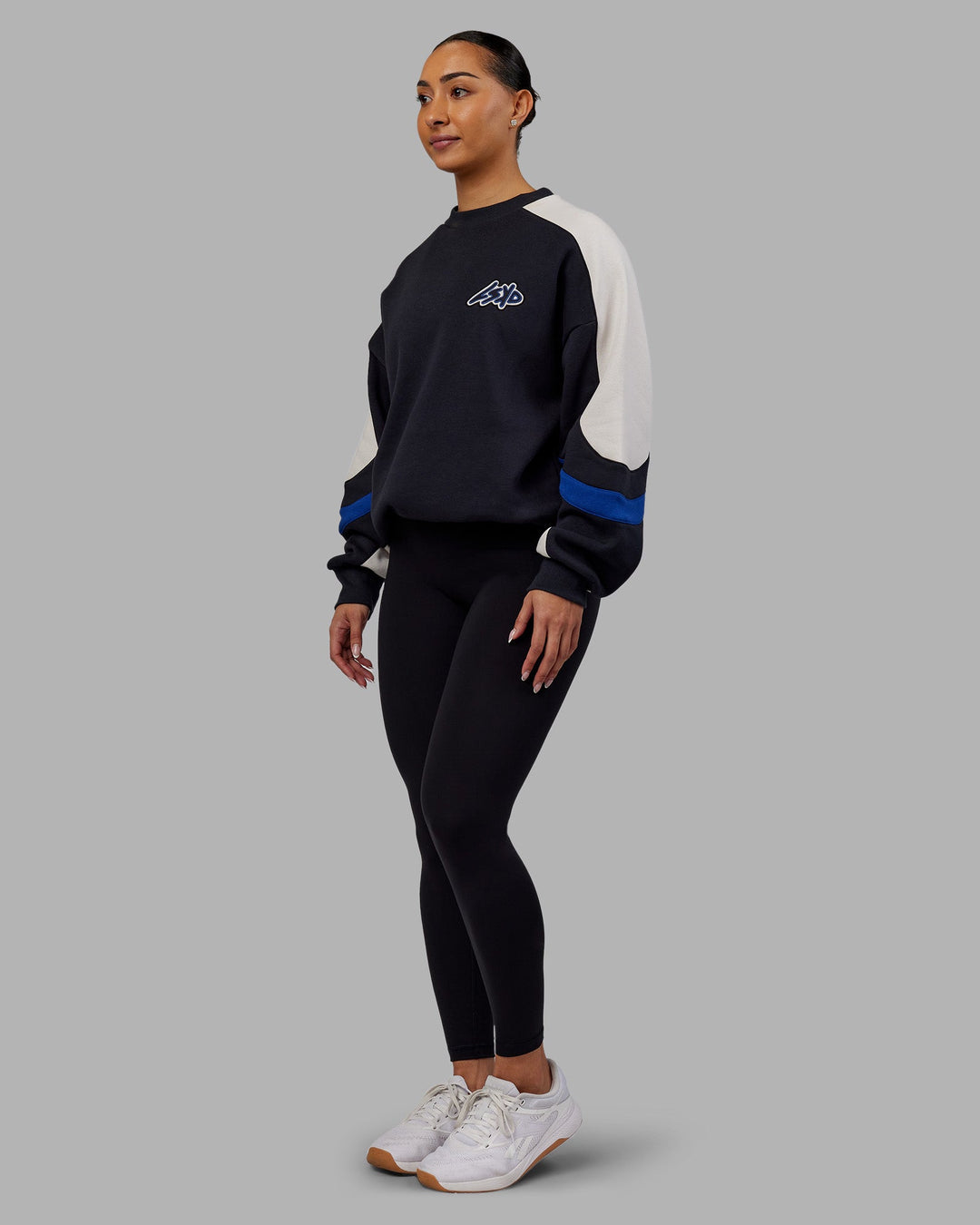 Woman wearing Vibe Oversized Unisex Sweater - Caviar-Midnight Blue | Model:Ayla | Size:XS