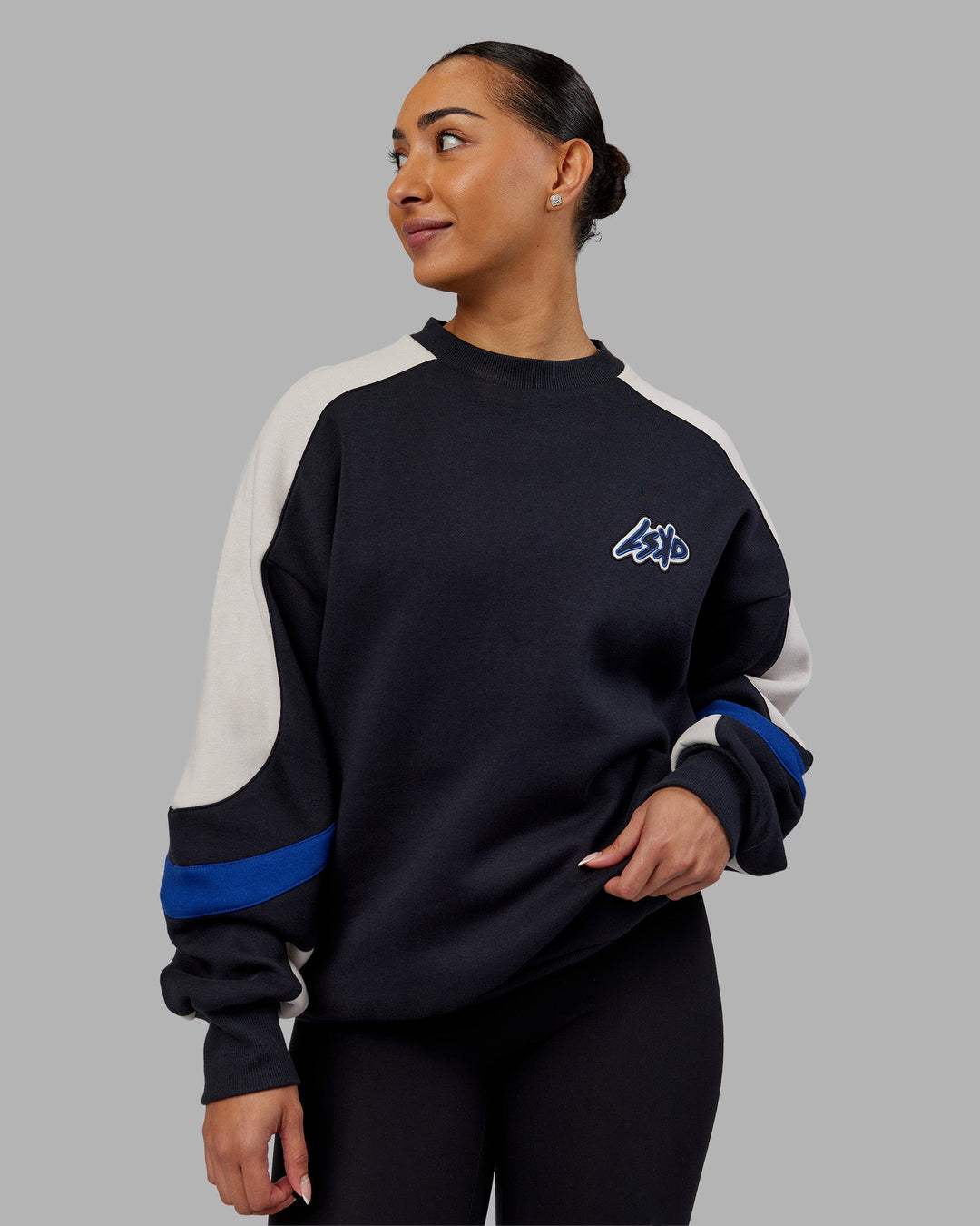 Woman wearing Vibe Oversized Unisex Sweater - Caviar-Midnight Blue | Model:Ayla | Size:XS
