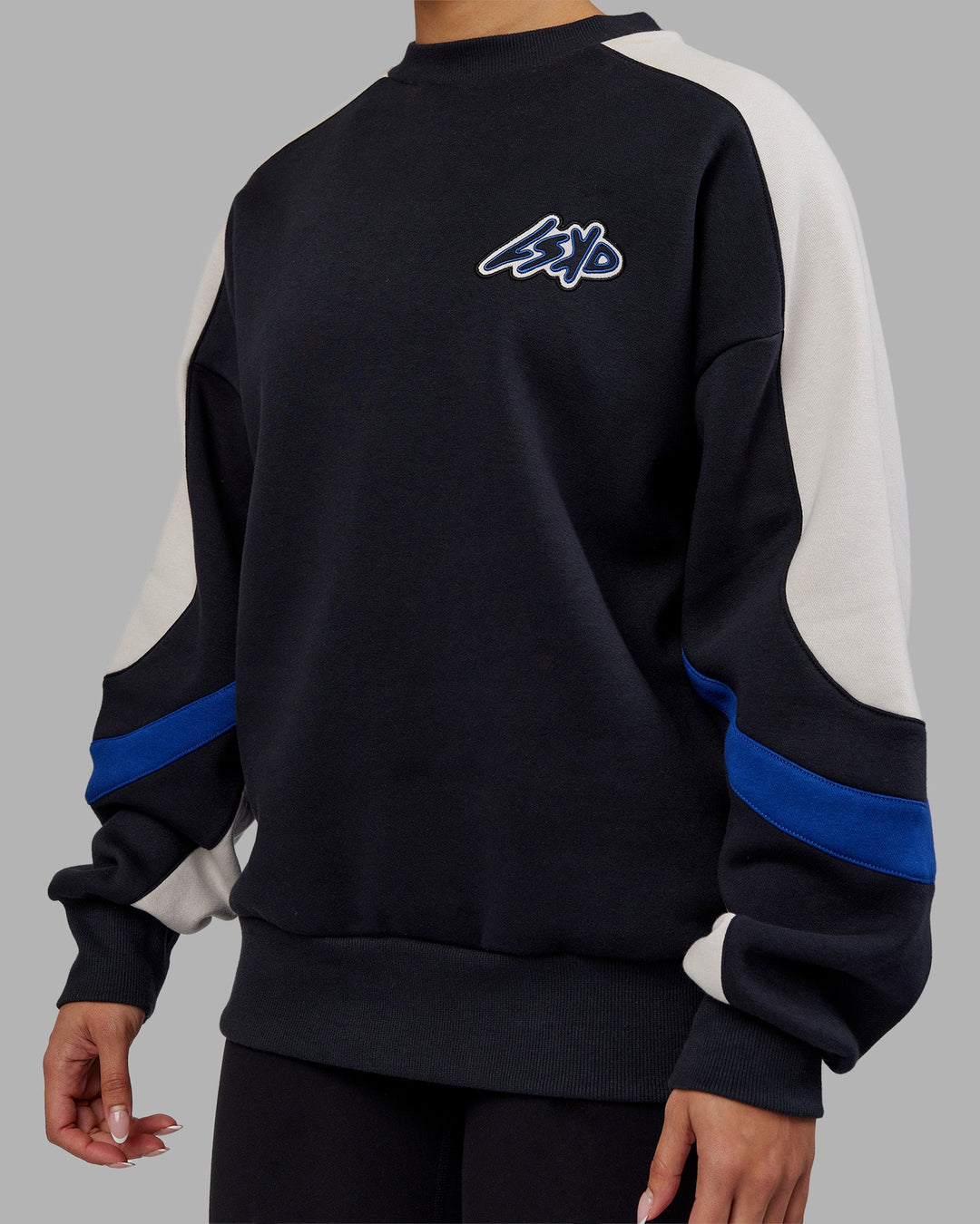 Woman wearing Vibe Oversized Unisex Sweater - Caviar-Midnight Blue | Model:Ayla | Size:XS