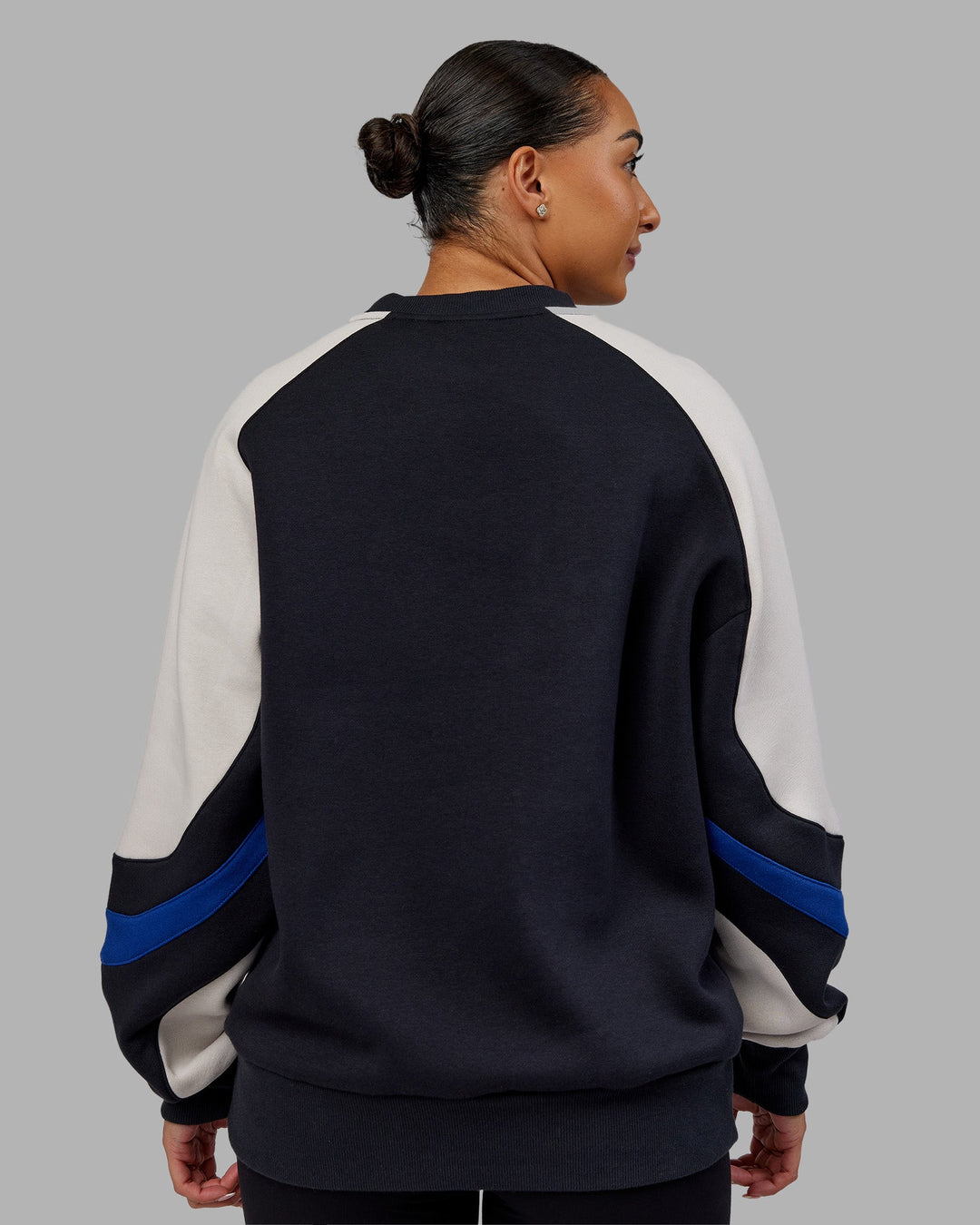 Woman wearing Vibe Oversized Unisex Sweater - Caviar-Midnight Blue | Model:Ayla | Size:XS