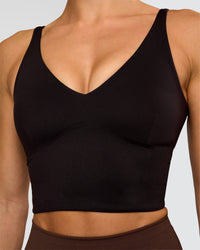 Woman wearing Vitality Long Line Sports Bra - Black | Model:Maja | Size:XS | Thumbnail Index: 4
