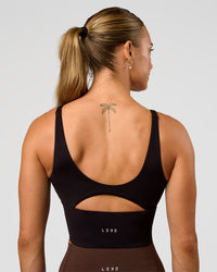 Woman wearing Vitality Long Line Sports Bra - Black | Model:Maja | Size:XS | Thumbnail Index: 1