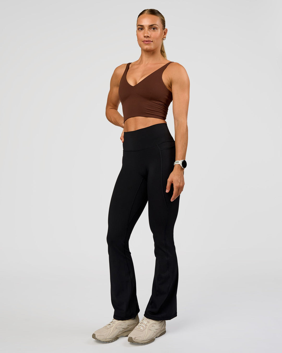 Woman wearing Vitality Long Line Sports Bra - Hot Chocolate | Model:Maja | Size:XS