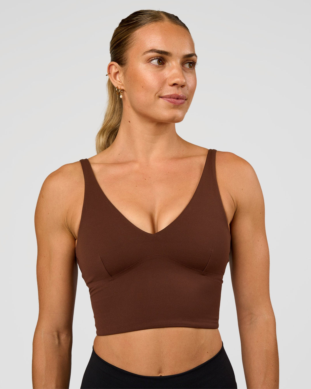 Woman wearing Vitality Long Line Sports Bra - Hot Chocolate | Model:Maja | Size:XS