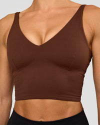 Woman wearing Vitality Long Line Sports Bra - Hot Chocolate | Model:Maja | Size:XS