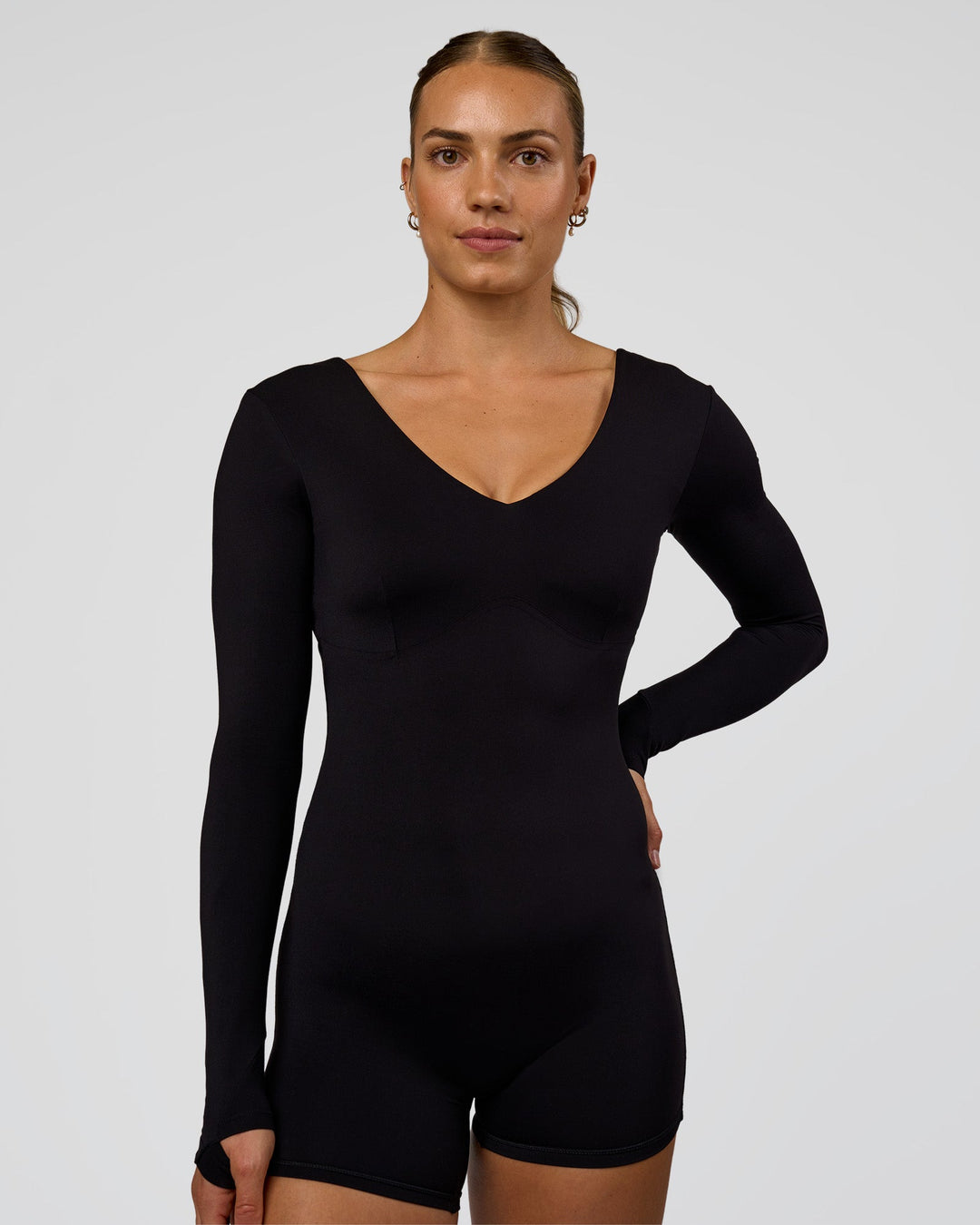 Woman wearing Vitality Long Sleeve Bodysuit - Black | Model:Maja | Size:XS