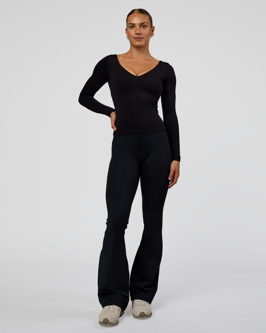Woman wearing Vitality Long Sleeve Top - Black | Model:Maja | Size:XS