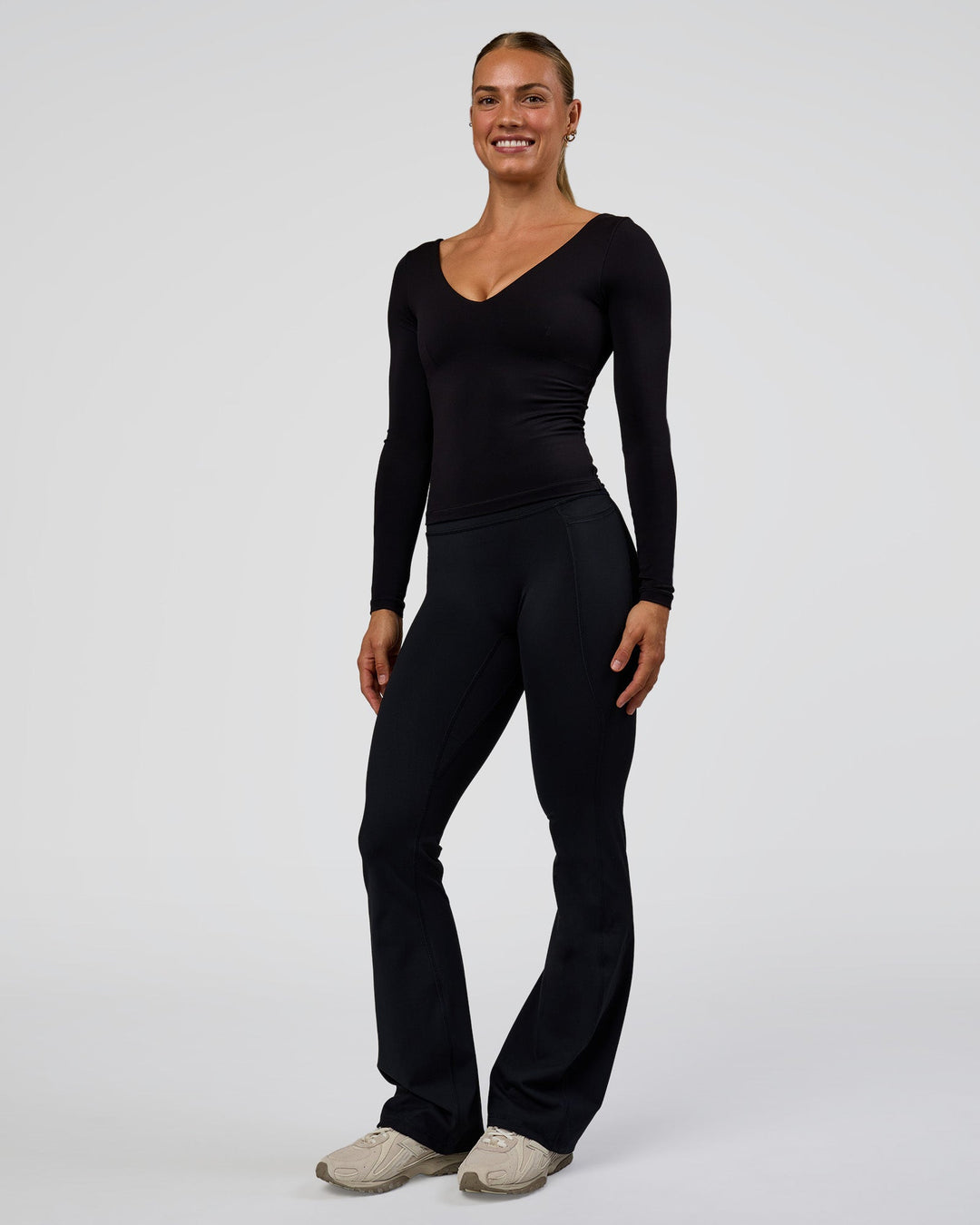 Woman wearing Vitality Long Sleeve Top - Black | Model:Maja | Size:XS