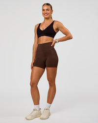 Woman wearing Vitality Sports Bra - Black | Model:Maja | Size:XS