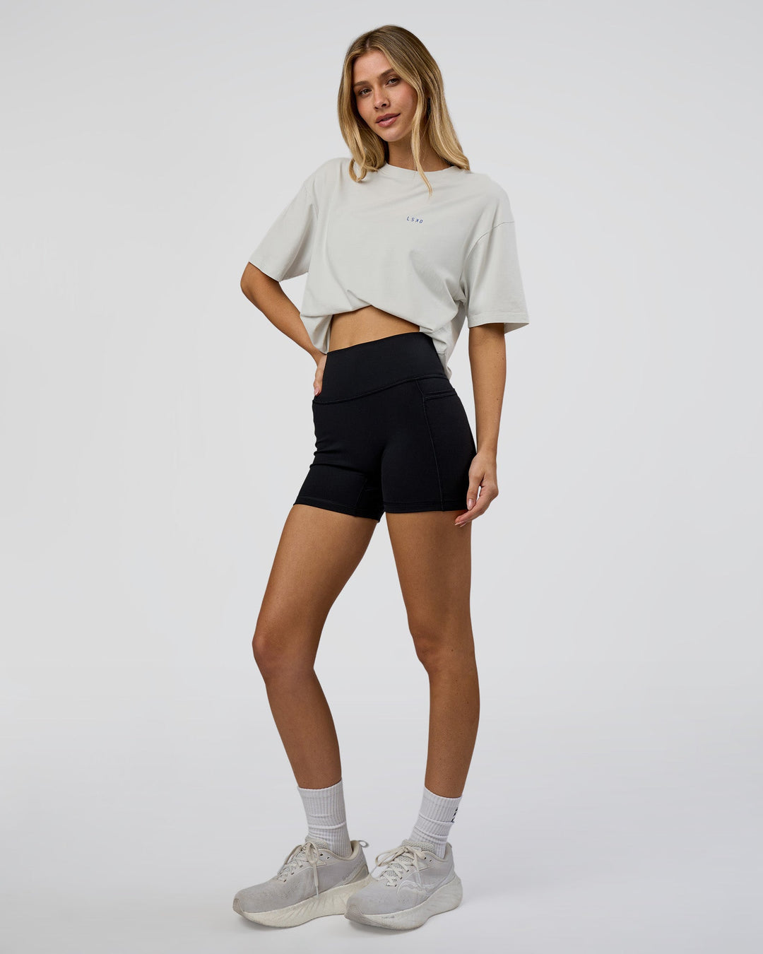 Woman wearing We Love This  FLXCotton Oversized Tee - Digital Mist Washed-Electric Indigo | Model:Leilani | Size:XS