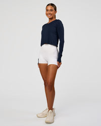 Woman wearing AeroFLX+ Seamless Long Sleeve Skimmer Tee - Future Navy/Future Navy | Model:Charli | Size:XS | Thumbnail Index: 9