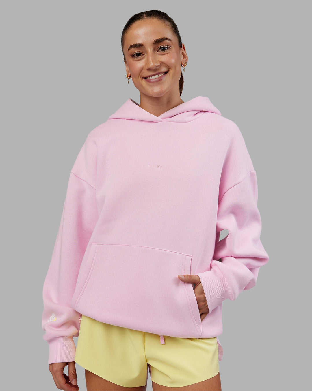 Woman wearing Your Race Oversized Hoodie - Marshmallow | Model:Grace | Size:XS